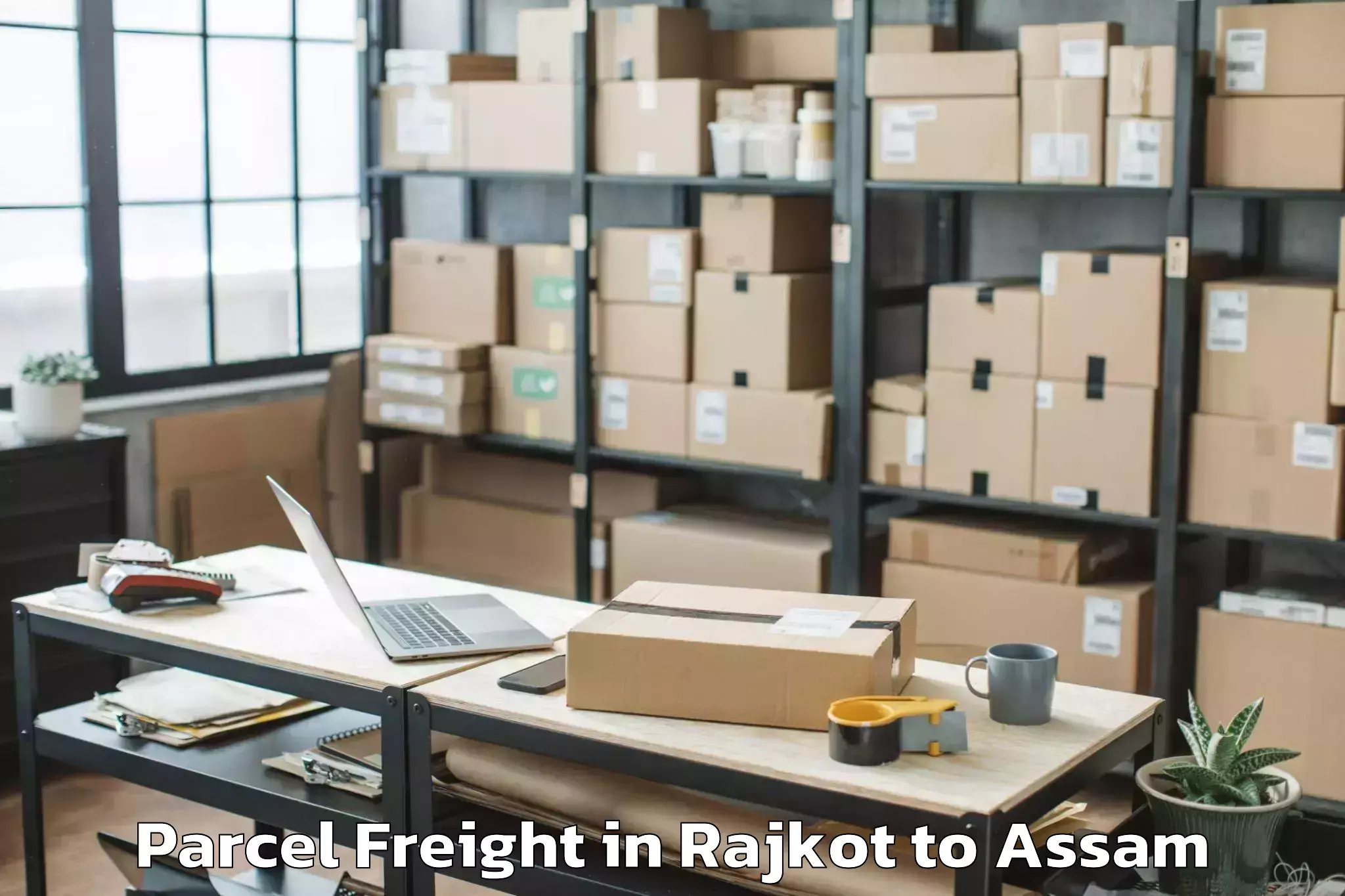 Book Rajkot to Bijni Pt Parcel Freight Online